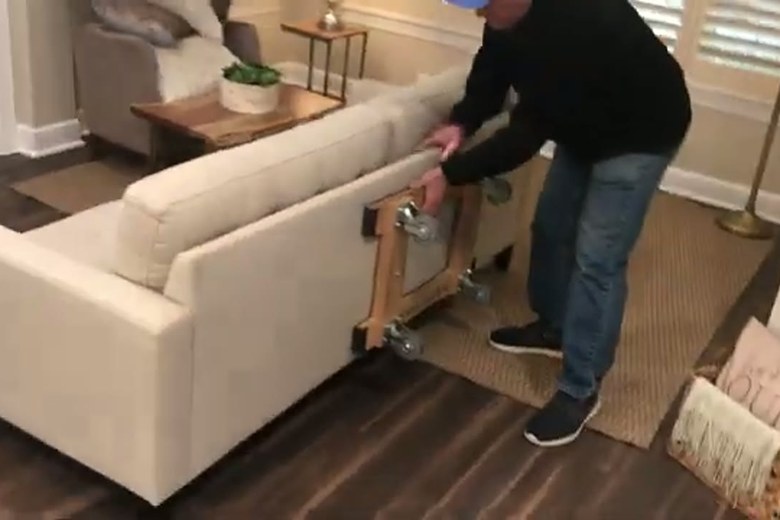 Sliding a sofa into place